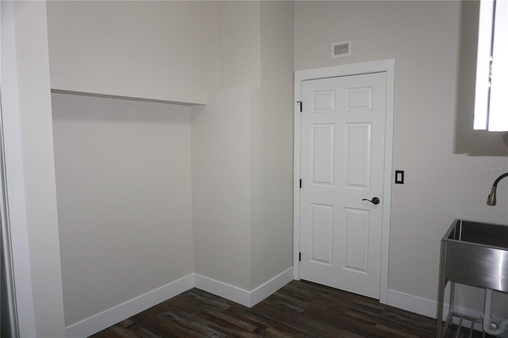 6722 Southwest 111th Loop Ocala, FL 34476 - Photo 45 of 51 OTHER SIDE OF LAUNDRY ROOM
