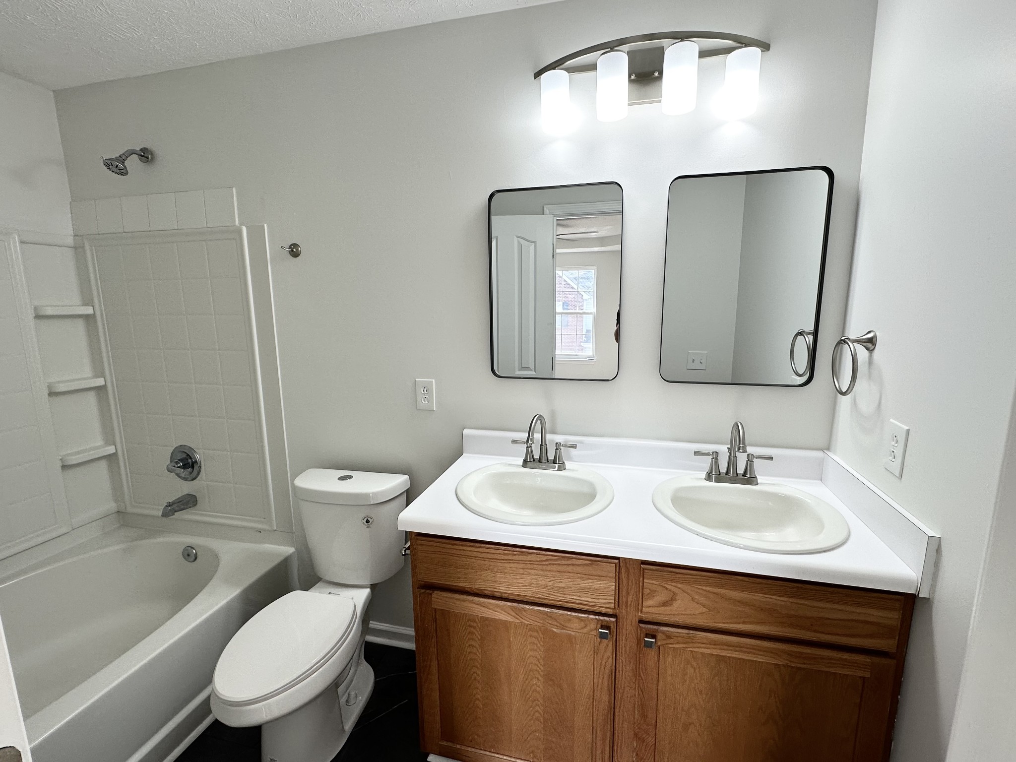 202 Latimer Drive Smyrna, TN 37167 - Photo 14 of 30 a bathroom with a toilet sink and mirror