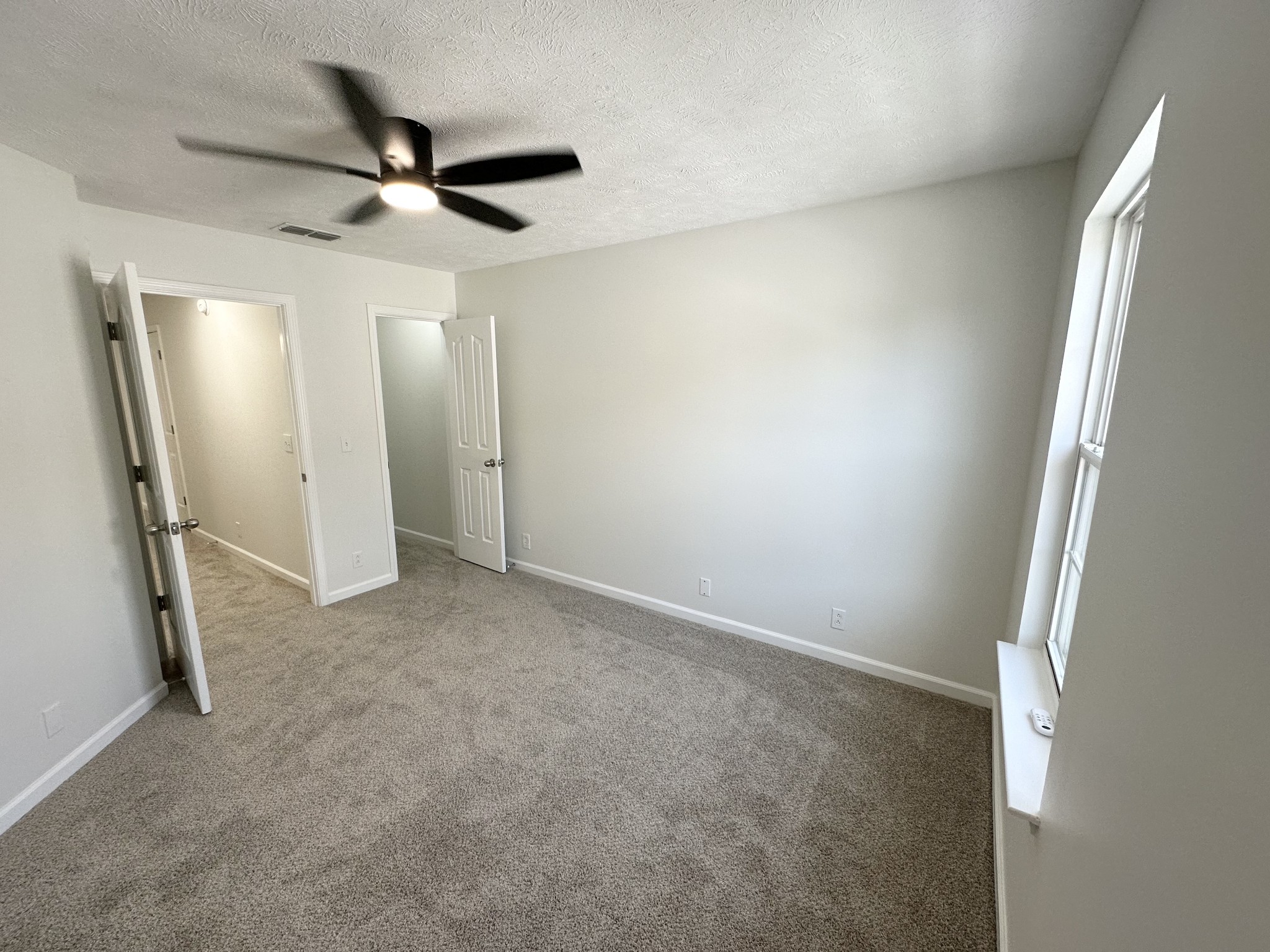 202 Latimer Drive Smyrna, TN 37167 - Photo 18 of 30 an empty room with closet and a window
