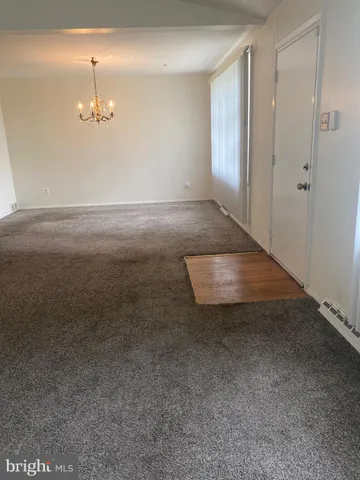 an empty room with an entryway