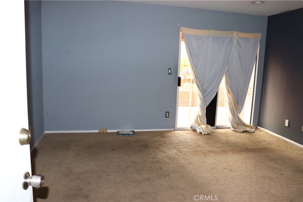 5642 Lighthouse Lane Palmdale, CA 93552 - Photo 16 of 24 an empty room with windows