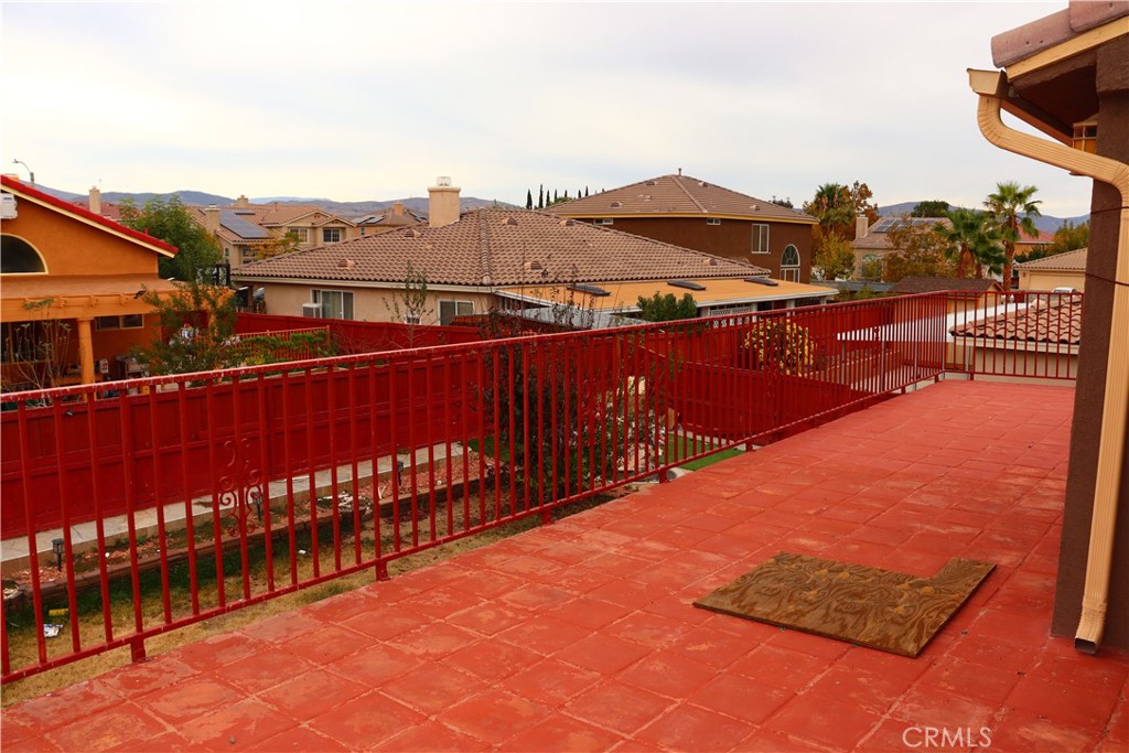 5642 Lighthouse Lane Palmdale, CA 93552 - Photo 23 of 24 a view of a terrace with sitting area