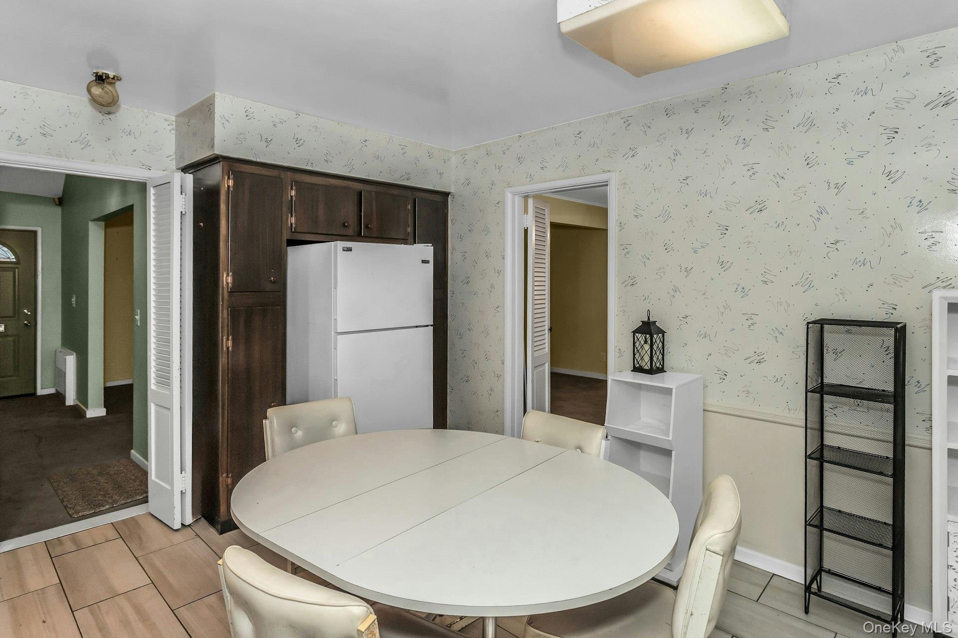 477 Demott Avenue Baldwin, NY 11510 - Photo 13 of 27 a bathroom with a sink and a mirror