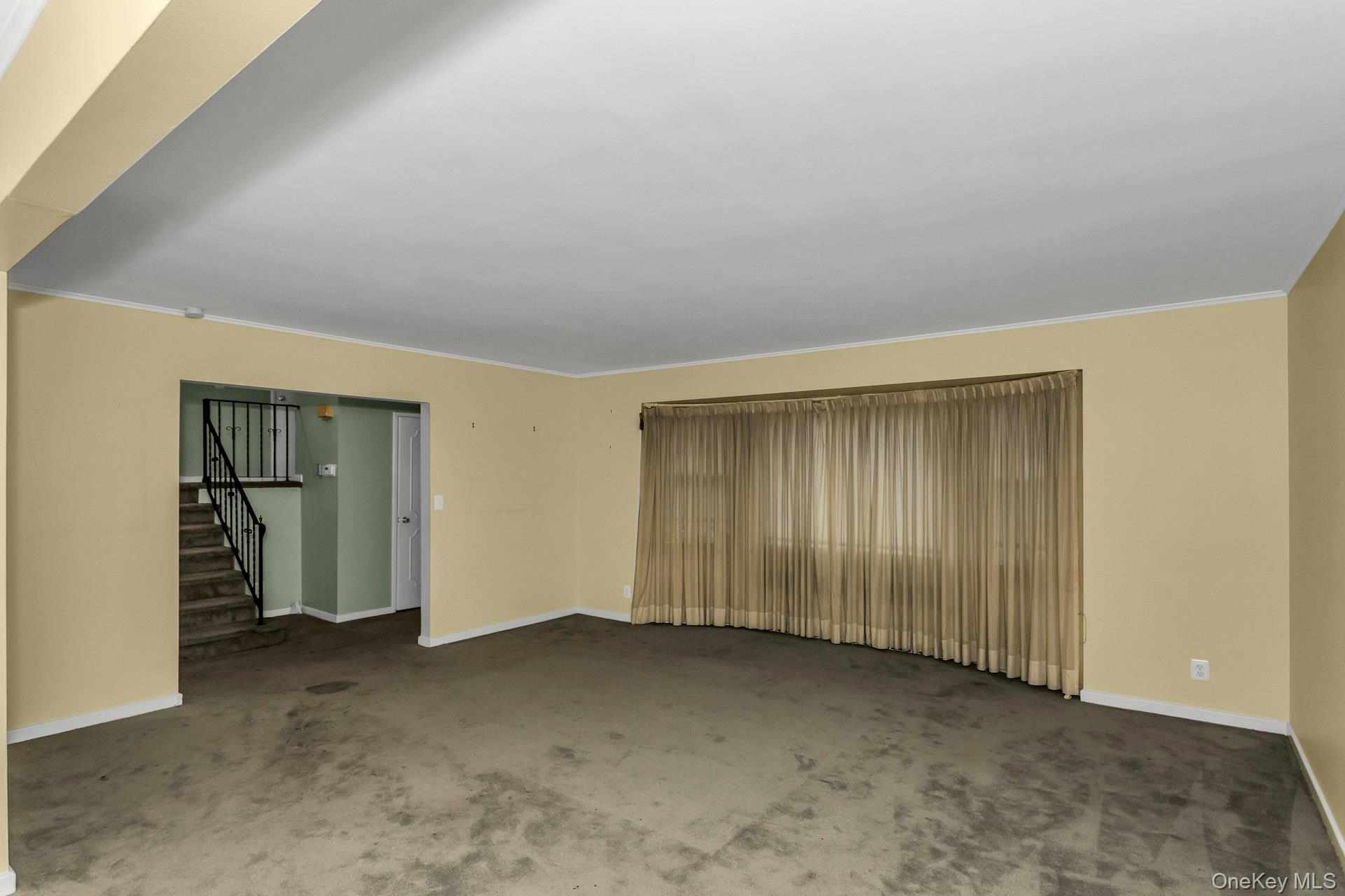 477 Demott Avenue Baldwin, NY 11510 - Photo 8 of 27 an empty room with closet area