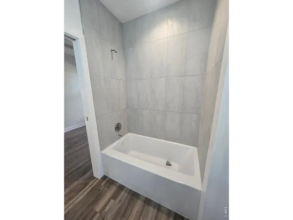 a bathroom with a bathtub