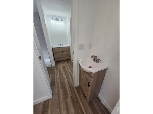 a bathroom with a toilet and a sink