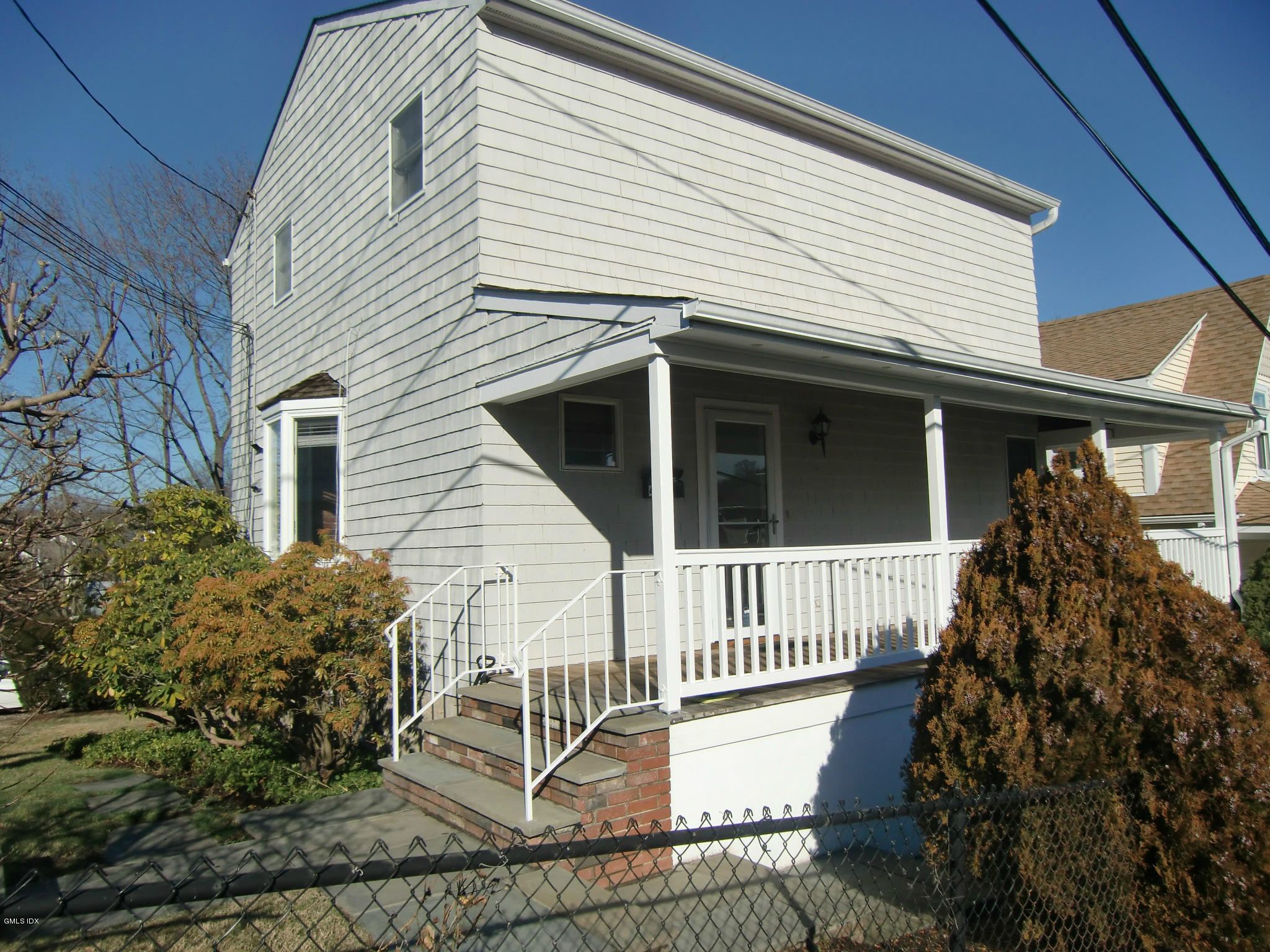 42 Harold Street Cos Cob, CT 06807 - Photo 1 of 10 a view of a house with a yard