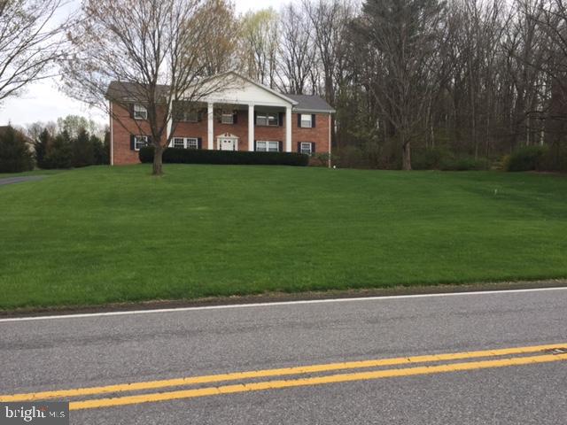 2990 Buffalo Run Road Bellefonte, PA 16823 - Photo 2 of 12 a front view of a house with a yard