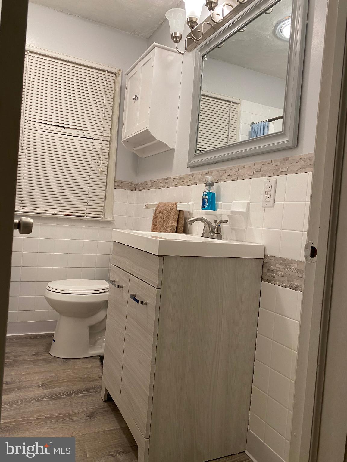2990 Buffalo Run Road Bellefonte, PA 16823 - Photo 4 of 12 a bathroom with a toilet sink and mirror