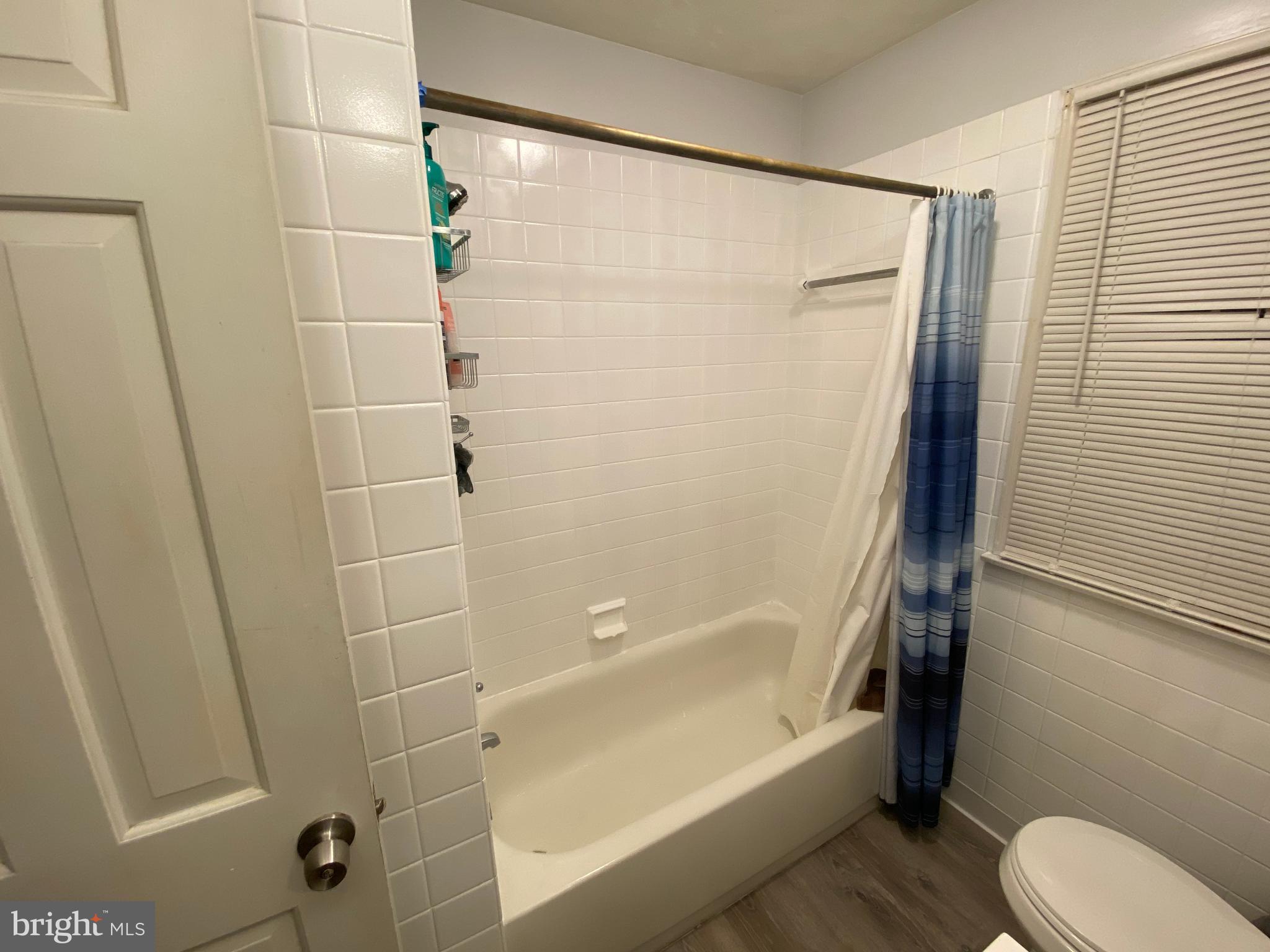 2990 Buffalo Run Road Bellefonte, PA 16823 - Photo 7 of 12 a bathroom with a shower and a toilet