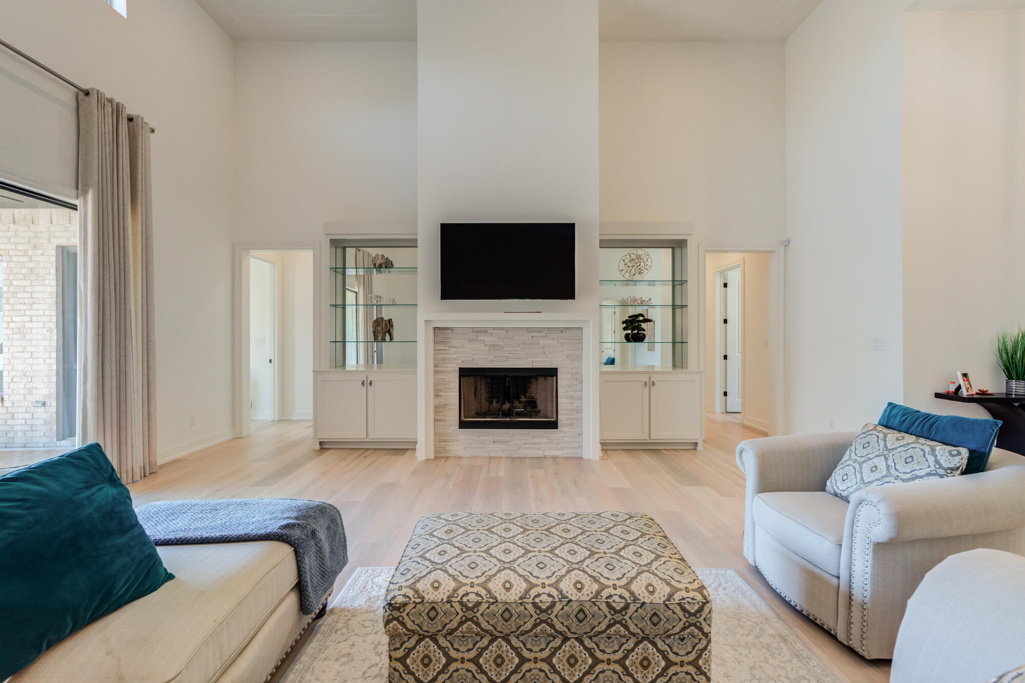 4813 5th Street Lubbock, TX 79416 - Photo 18 of 62 a living room with furniture and a fireplace