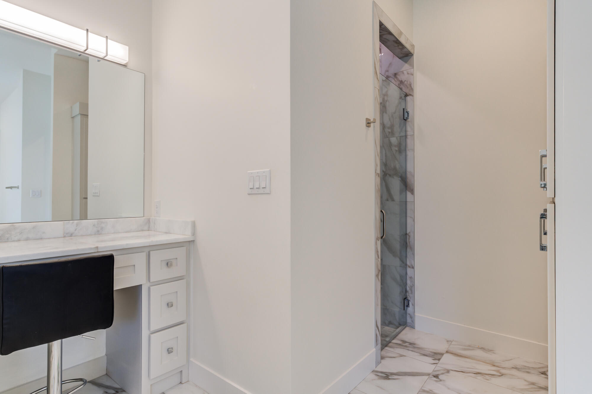 4813 5th Street Lubbock, TX 79416 - Photo 34 of 62 a bathroom with a sink and a mirror
