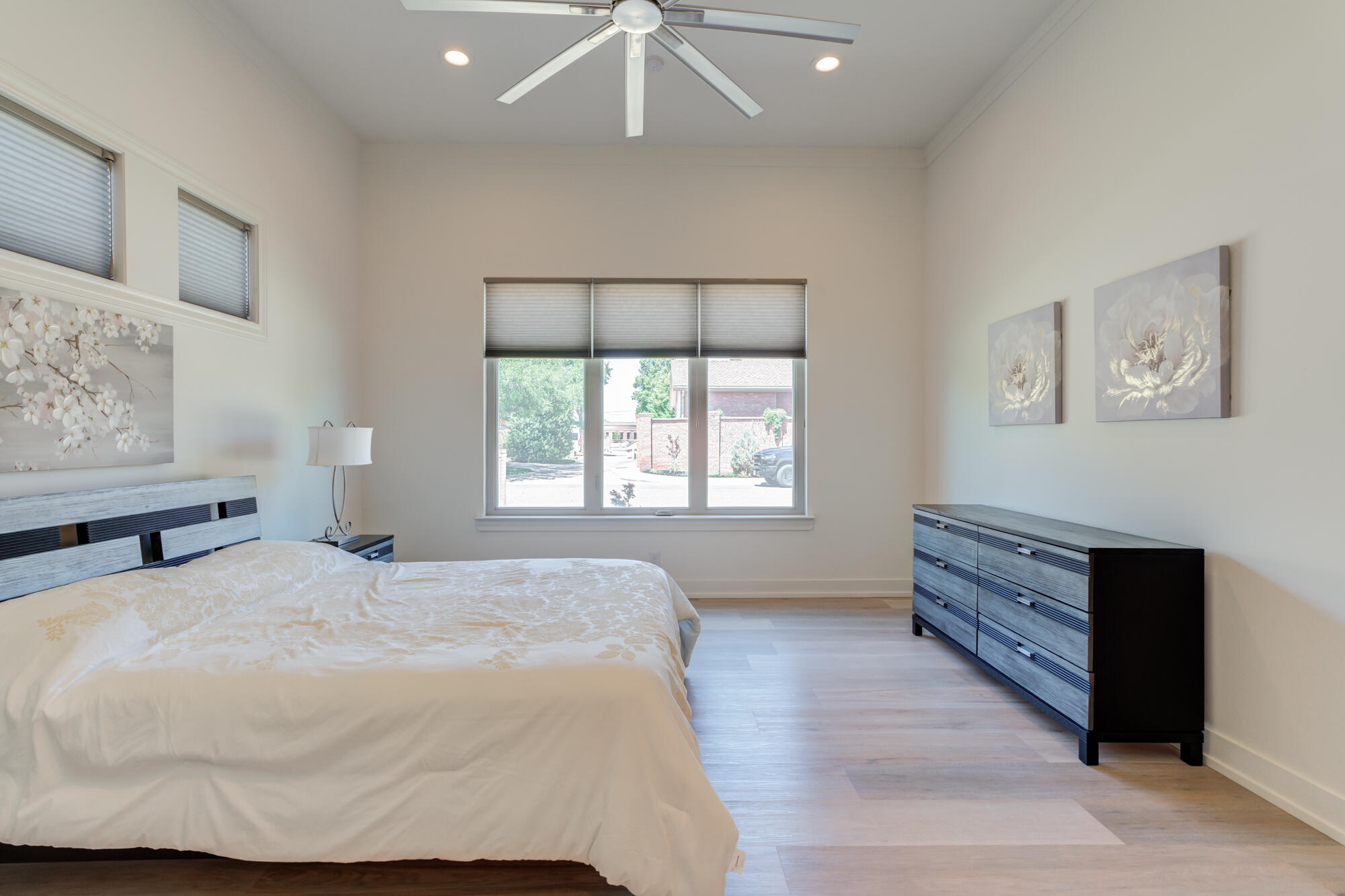 4813 5th Street Lubbock, TX 79416 - Photo 52 of 62 a bedroom with a bed and a window