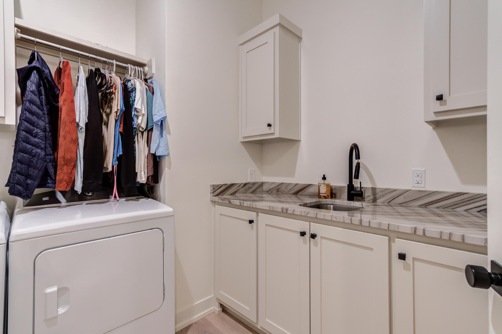 4813 5th Street Lubbock, TX 79416 - Photo 56 of 62 a utility room with dryer and washer