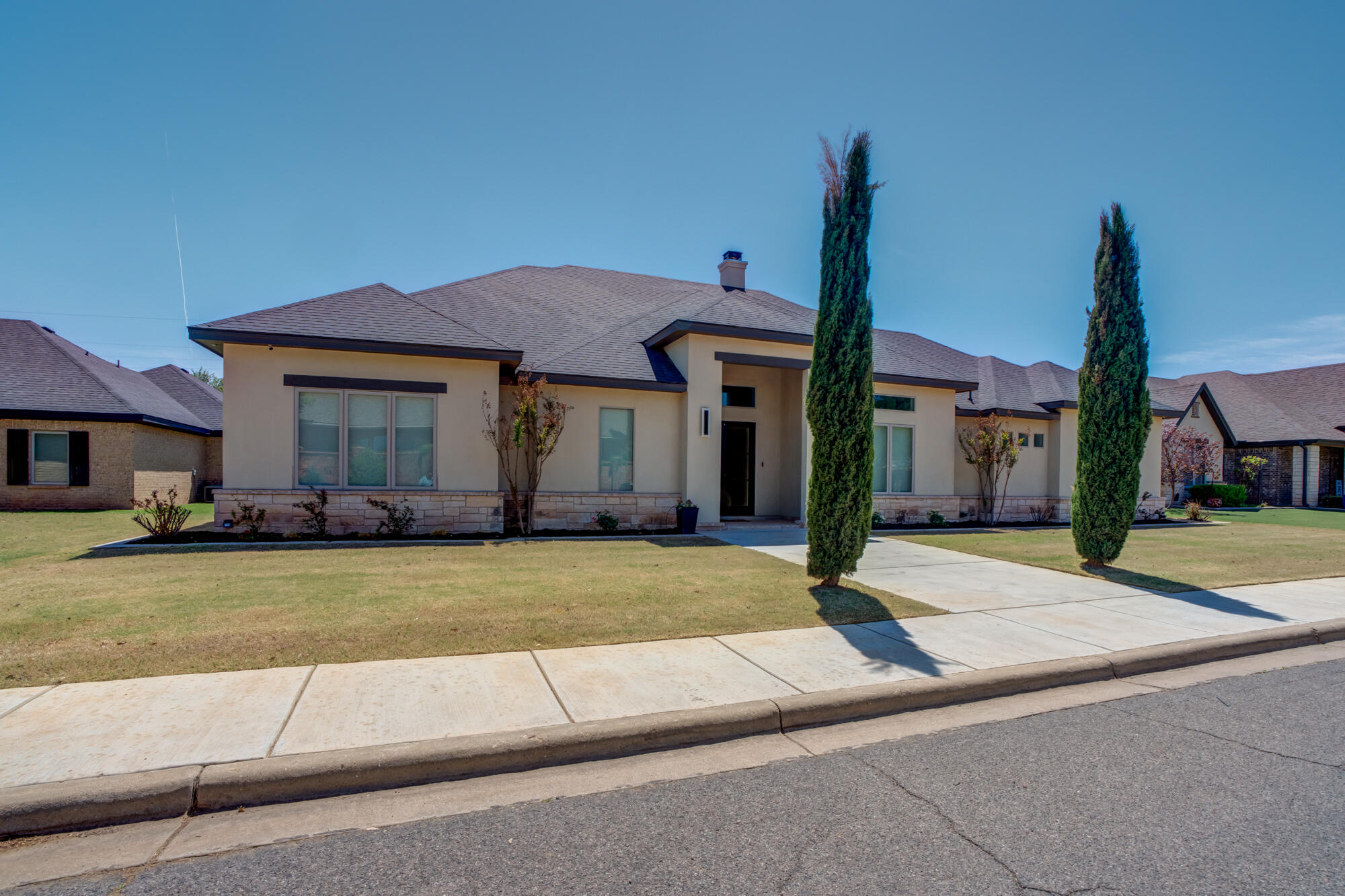 4813 5th Street Lubbock, TX 79416 - Photo 6 of 62 a front view of a house with garden