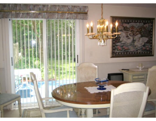 103 D Ridgefield Circle, Unit D Clinton, MA 01510 - Photo 5 of 12 a living room with a couch and a large window