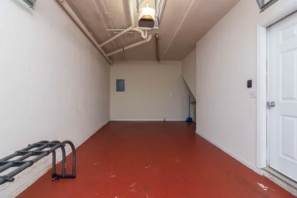 a view of a lobby with furniture and floor to ceiling window