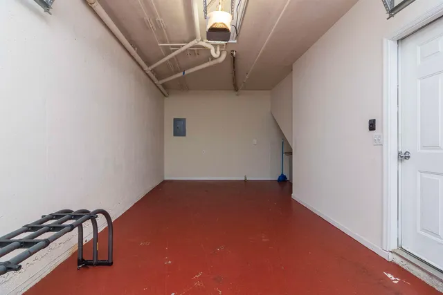 a view of a lobby with furniture and floor to ceiling window