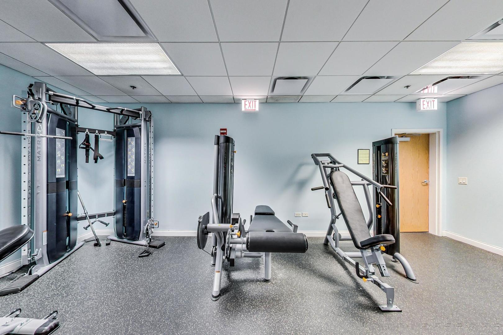 8 West Monroe Street, Unit 704 Chicago, IL 60603 - Photo 30 of 35 a view of a room with gym equipment