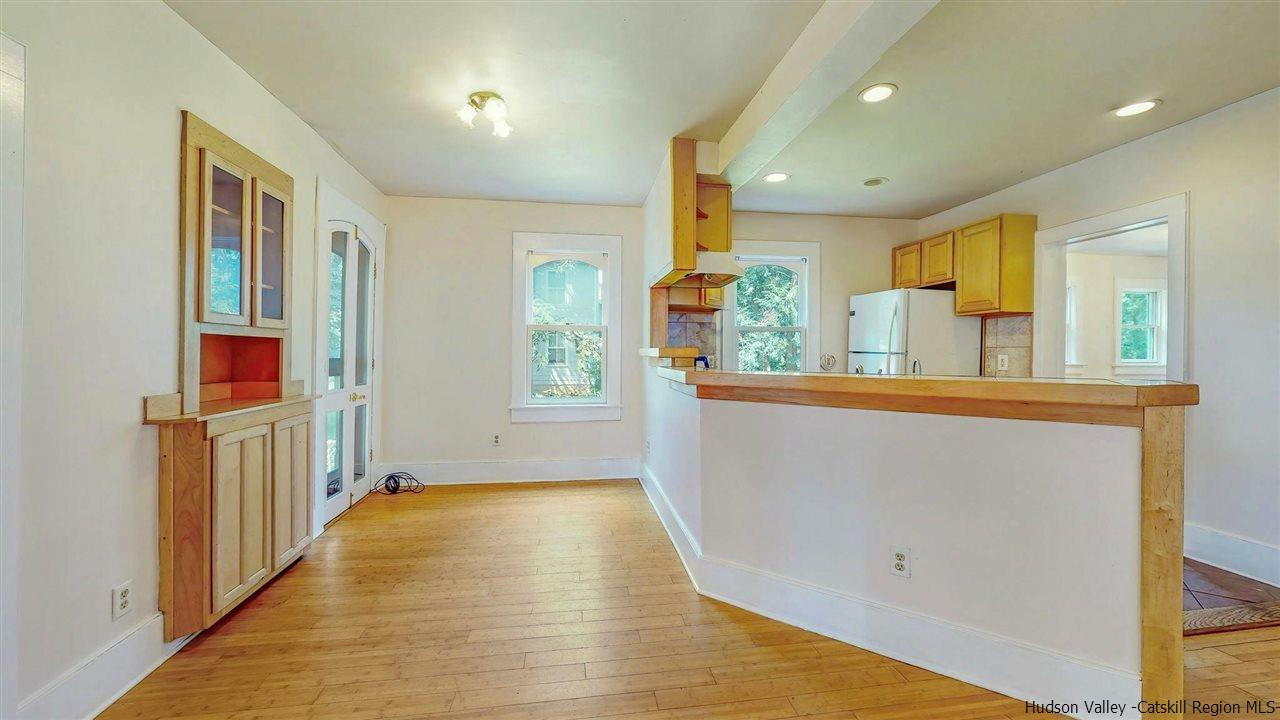 322 Main Street Rosendale, NY 12472 - Photo 13 of 35 wooden floor in an empty room with a window