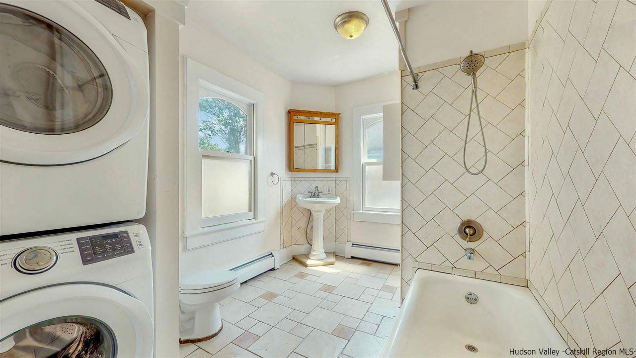 322 Main Street Rosendale, NY 12472 - Photo 14 of 35 a bathroom with a sink a toilet and a shower
