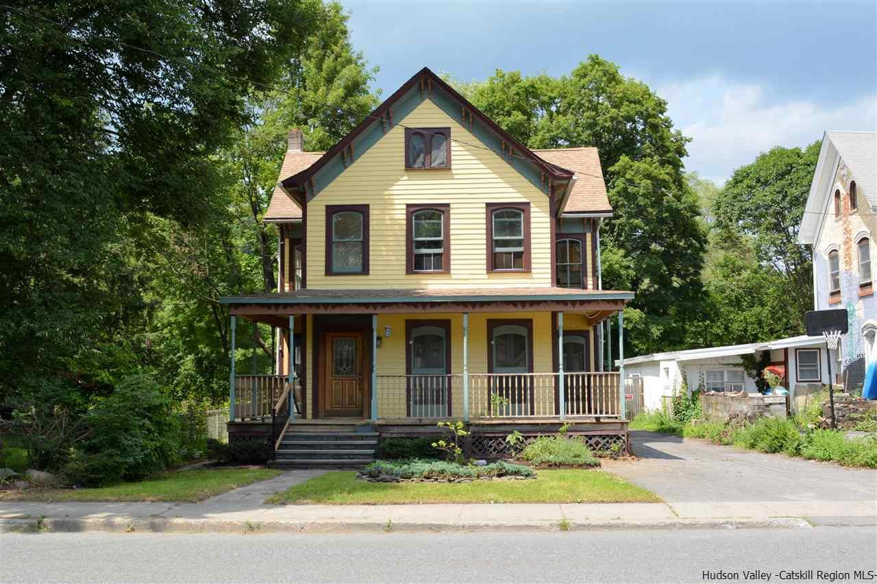 322 Main Street Rosendale, NY 12472 - Photo 2 of 35 a front view of a house with a yard