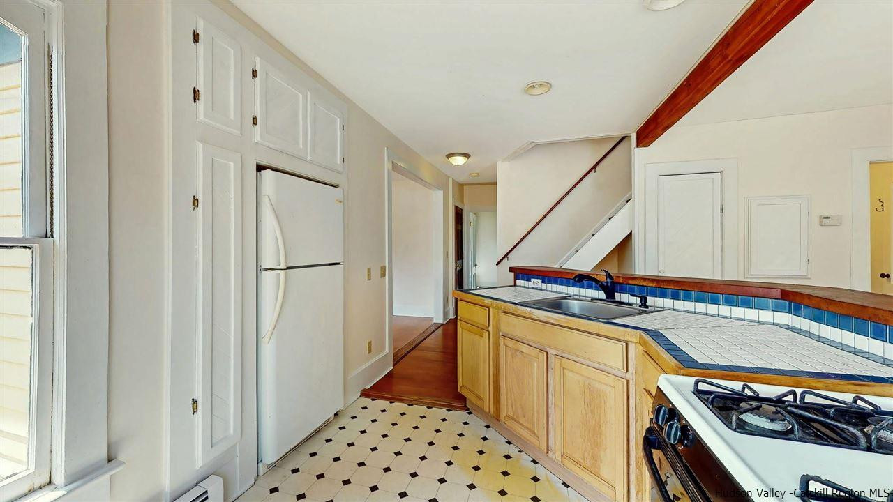 322 Main Street Rosendale, NY 12472 - Photo 24 of 35 a kitchen with stainless steel appliances a refrigerator and a stove
