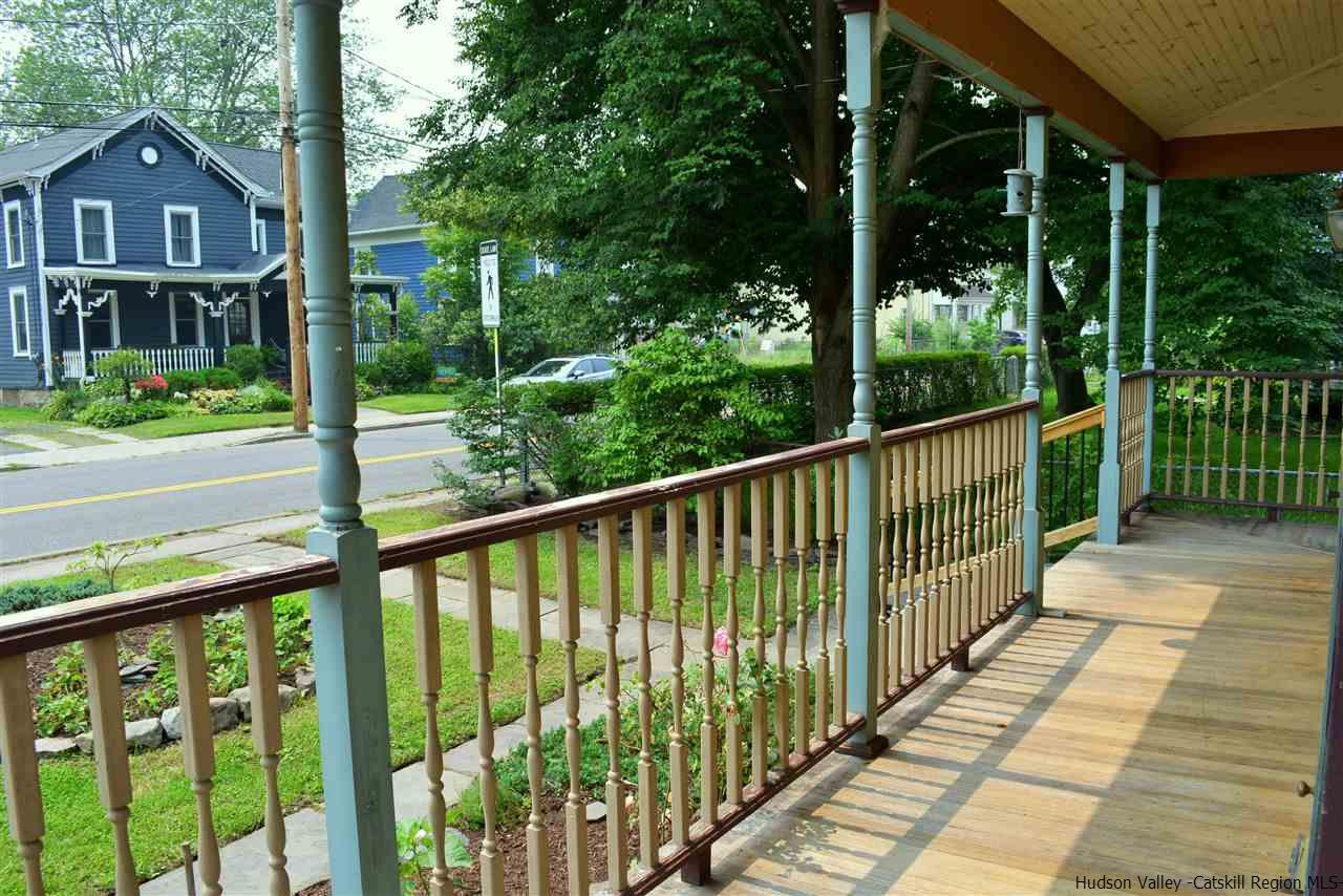 322 Main Street Rosendale, NY 12472 - Photo 6 of 35 a view of a brick house with a large windows and a yard