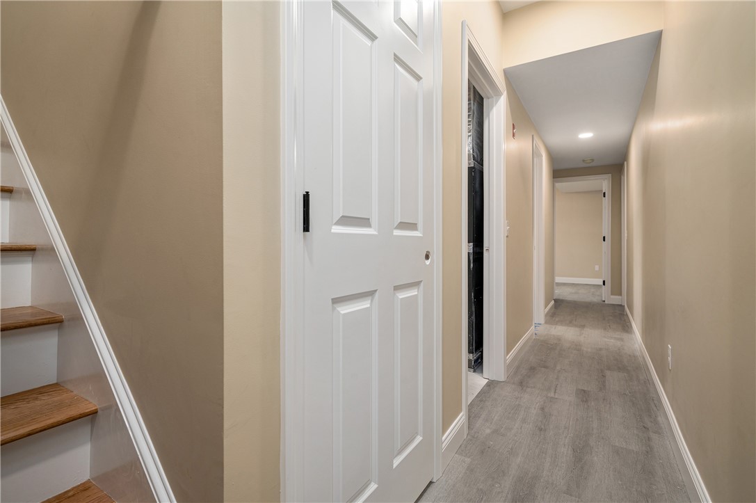 23 Henry Street Woonsocket, RI 02895 - Photo 23 of 33 View of lower level hallway.