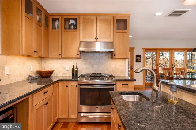 a view of balcony with wooden floor