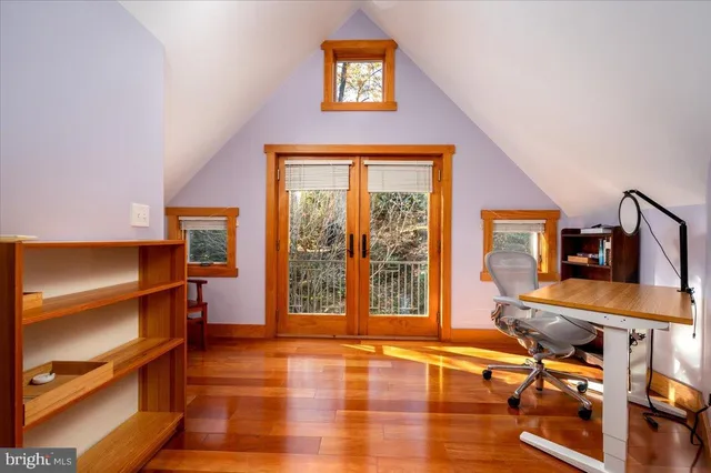 a view of a balcony with trees