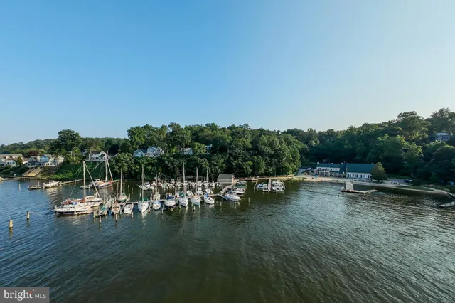 a bathroom with a granite countertop sink mirror and double