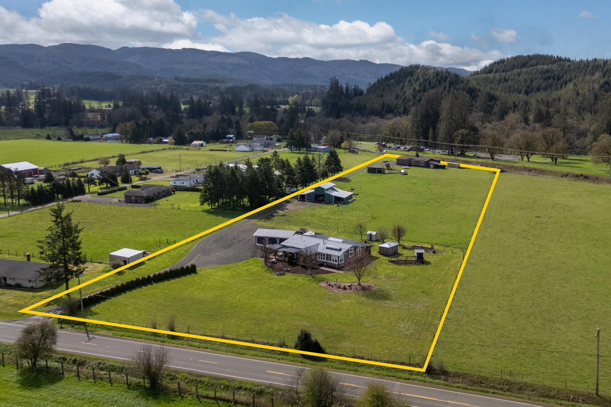 7400 South Prairie Road Tillamook, OR 97141 - Photo 1 of 62 a view of a pool and a terrace