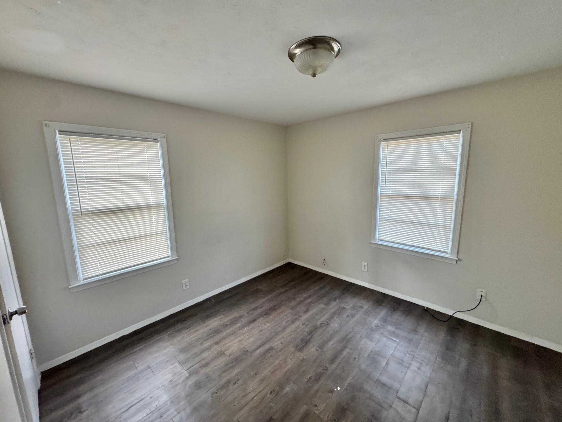 4967 Newton Road Memphis, TN 38109 - Photo 8 of 12 an empty room with a window