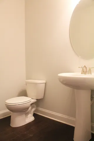 a bathroom with a sink and a toilet
