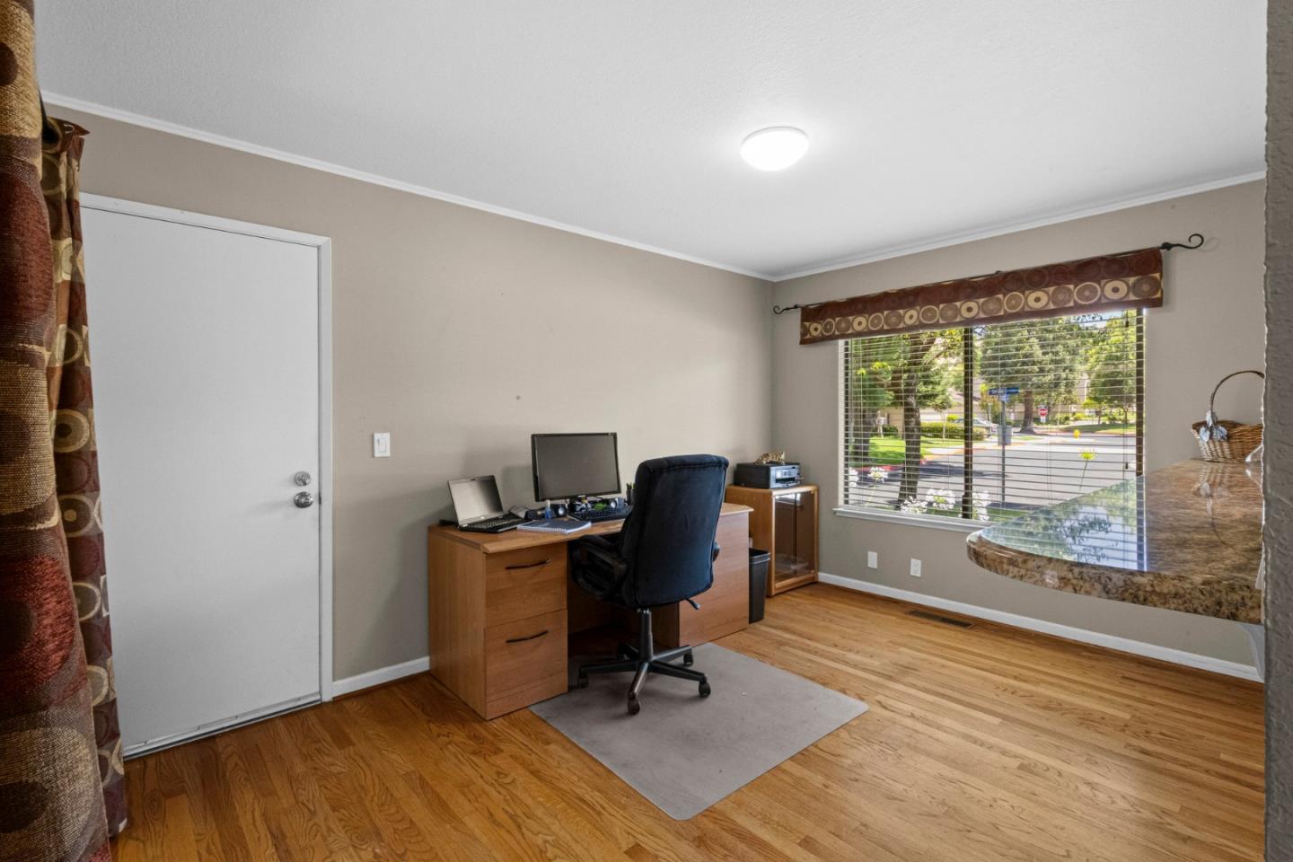 2137 Darnis Circle Morgan Hill, CA 95037 - Photo 14 of 66 a view of a workspace with furniture and a window