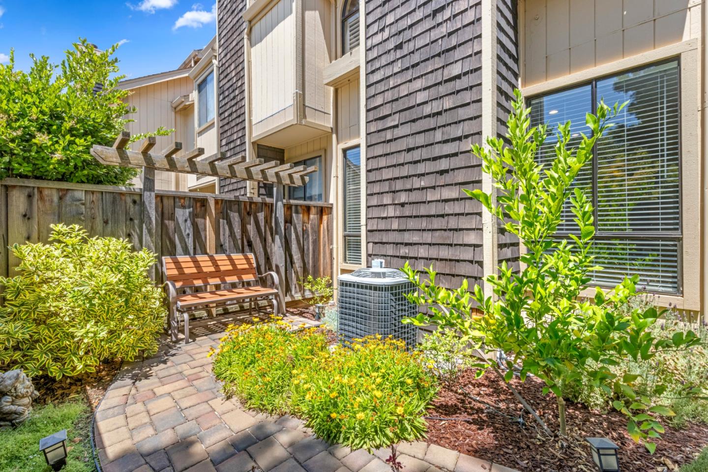 2137 Darnis Circle Morgan Hill, CA 95037 - Photo 46 of 66 a front view of a house with a garden