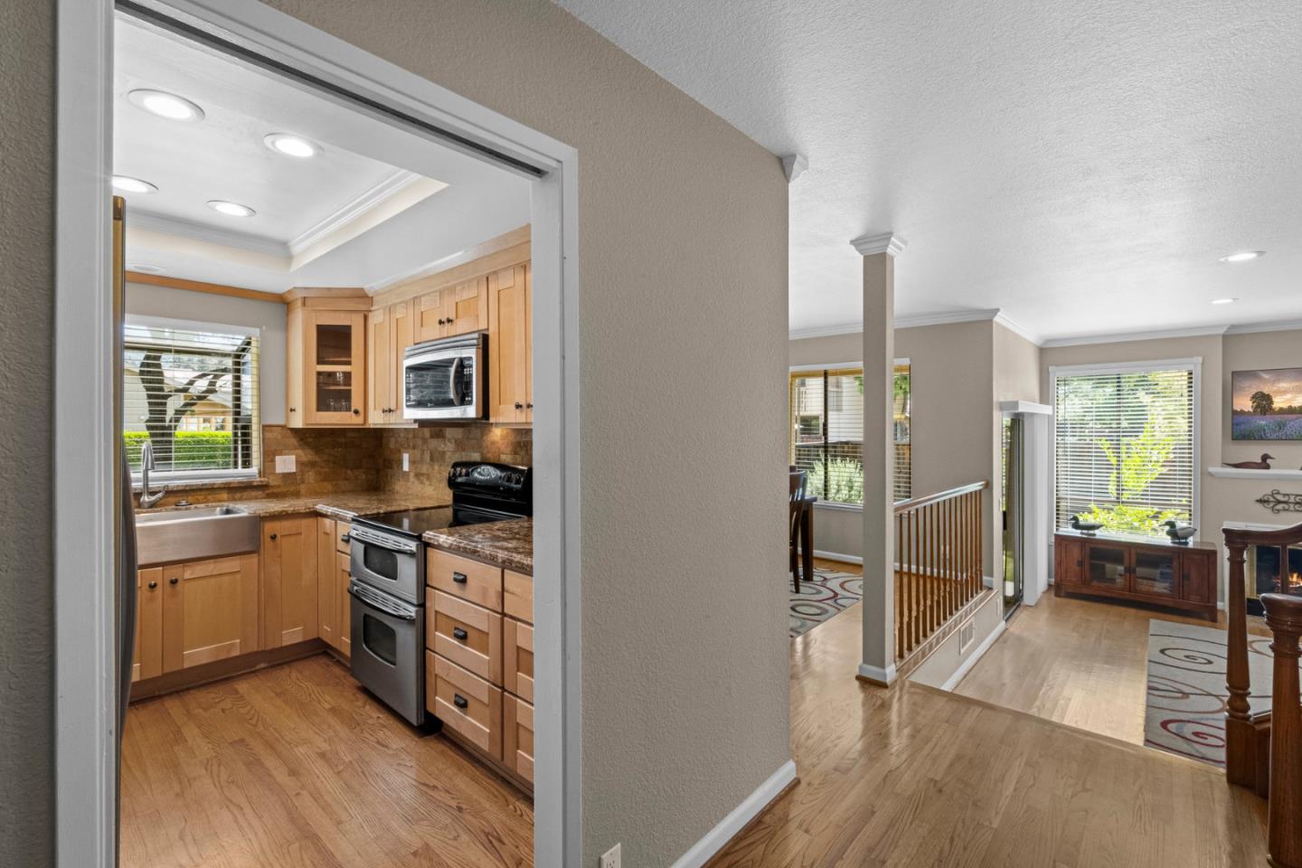 2137 Darnis Circle Morgan Hill, CA 95037 - Photo 8 of 66 a kitchen with stainless steel appliances granite countertop sink stove and refrigerator