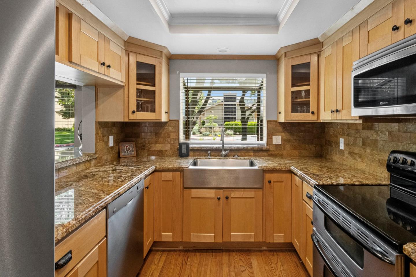 2137 Darnis Circle Morgan Hill, CA 95037 - Photo 9 of 66 a kitchen with stainless steel appliances granite countertop a sink and a stove