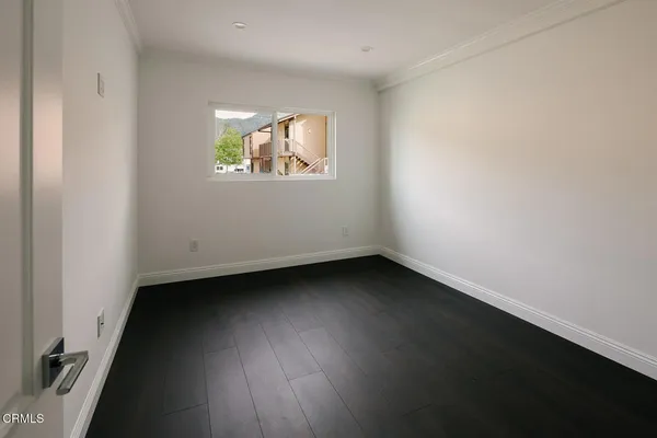 a house view with a garden space