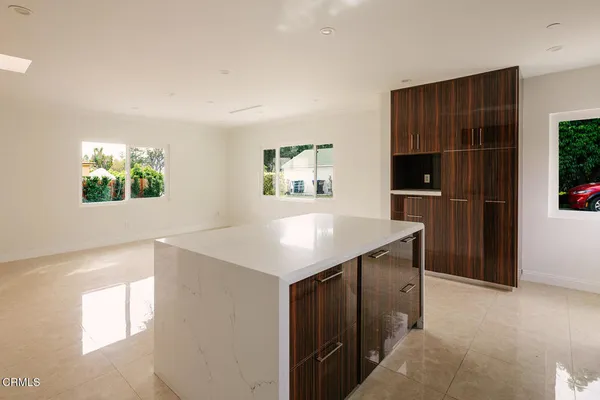a bathroom with a toilet a sink and a shower