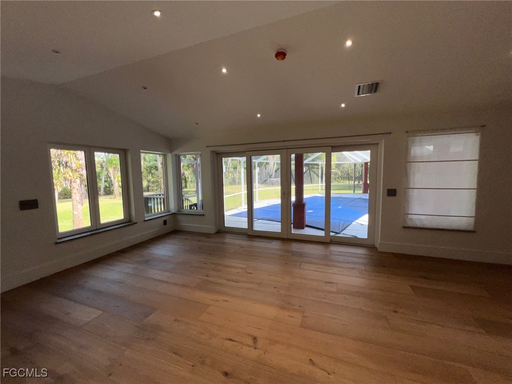 13191 Idylwild Farm Road Fort Myers, FL 33905 - Photo 14 of 21 an empty room with windows