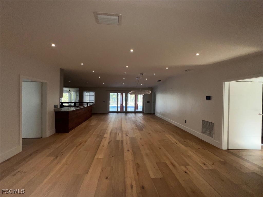 13191 Idylwild Farm Road Fort Myers, FL 33905 - Photo 6 of 21 a view of a kitchen with a sink and a refrigerator