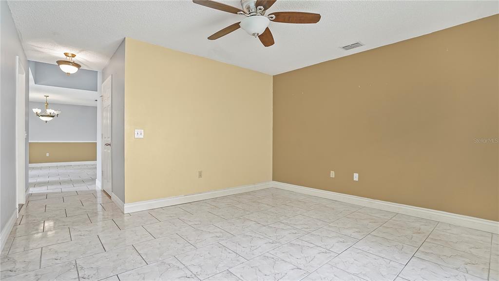 105 Caterham Way Kissimmee, FL 34758 - Photo 14 of 34 a view of an empty room