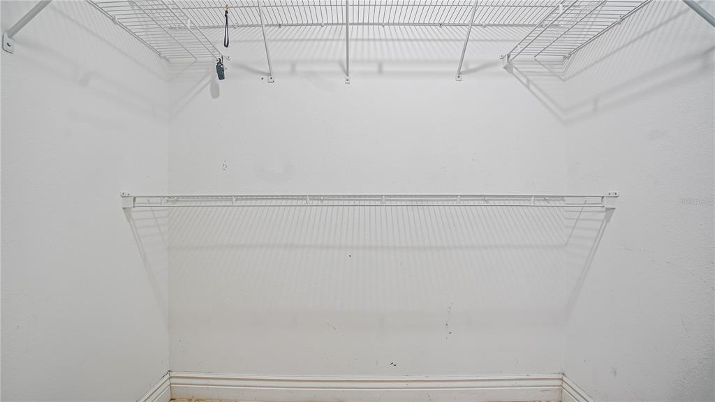 105 Caterham Way Kissimmee, FL 34758 - Photo 26 of 34 a close up view of racks on the wall