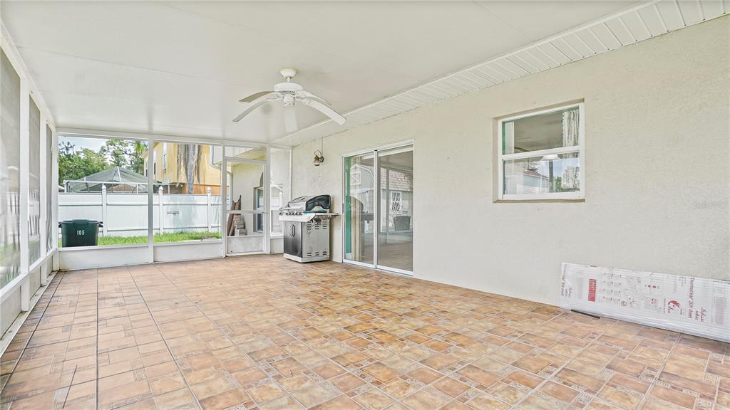 105 Caterham Way Kissimmee, FL 34758 - Photo 34 of 34 a view of an empty room with a window