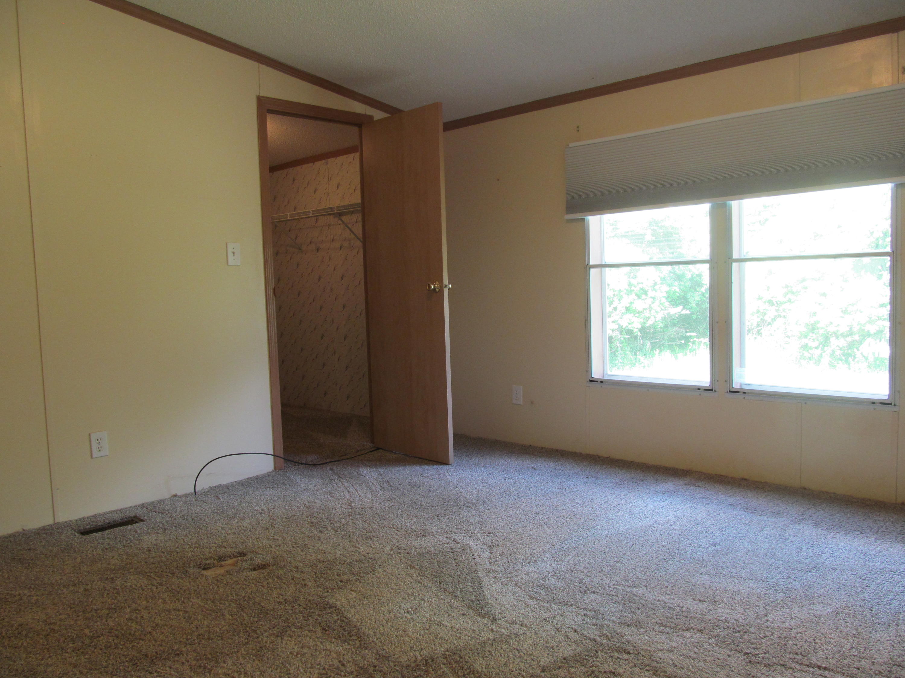 3016 Quarles Road Thaxton, VA 24174 - Photo 15 of 41 an empty room with windows