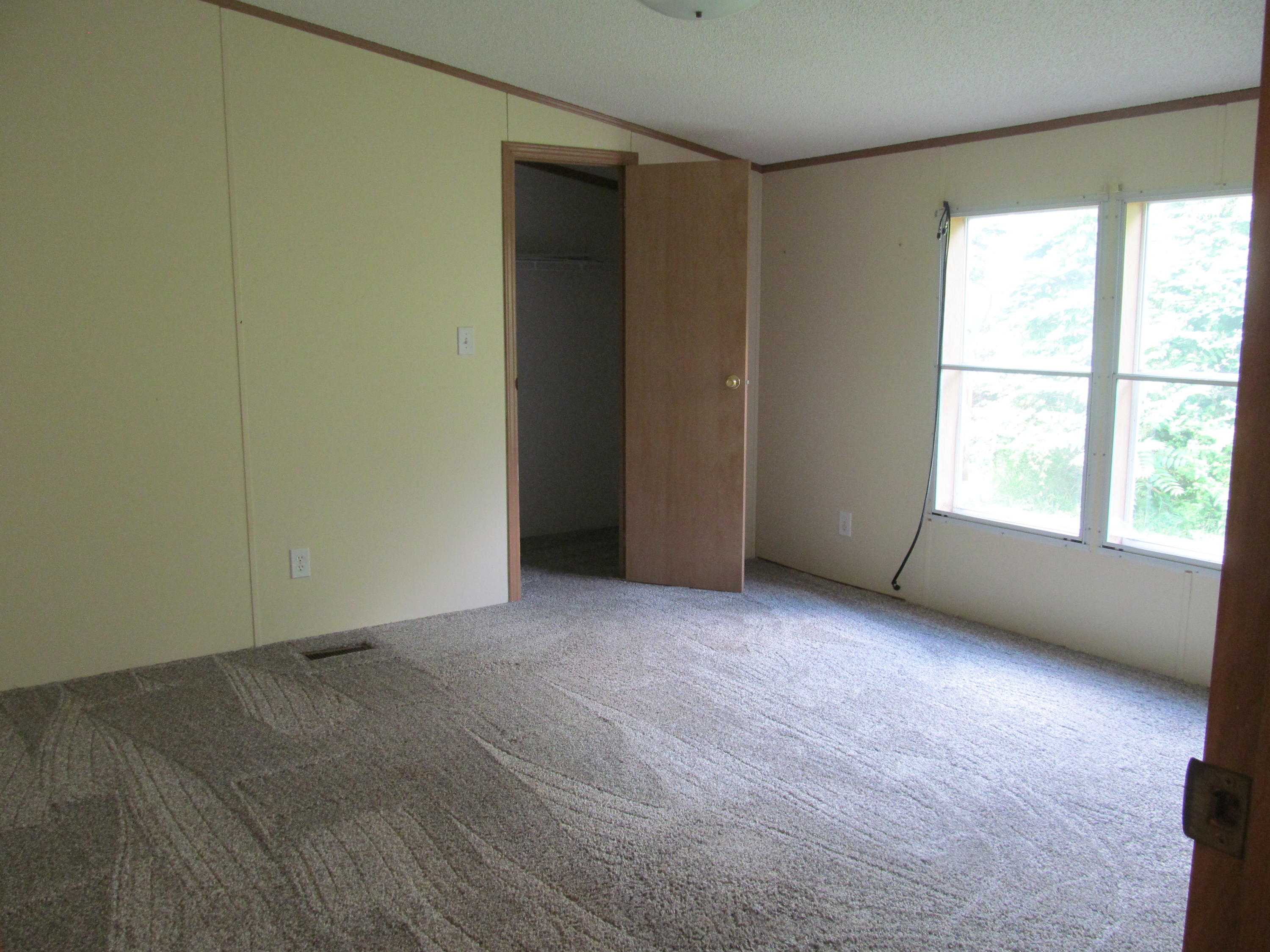 3016 Quarles Road Thaxton, VA 24174 - Photo 17 of 41 an empty room with a window
