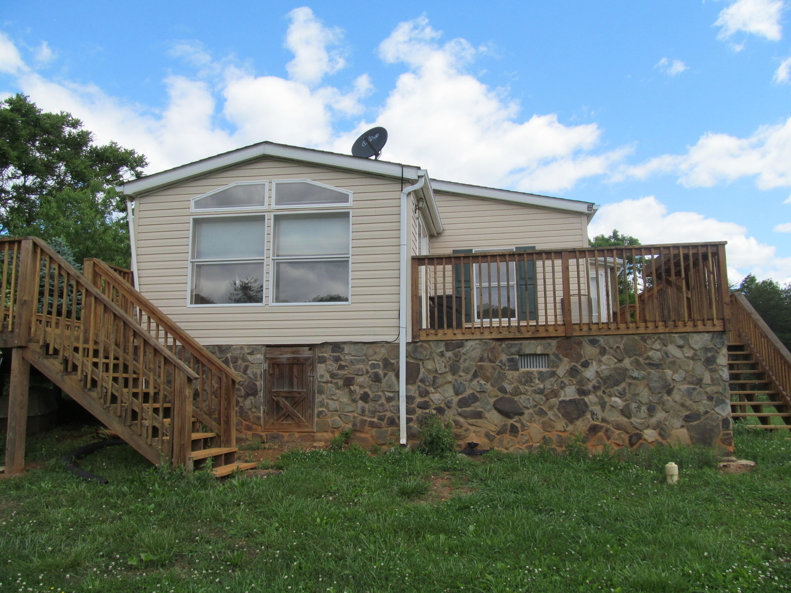 3016 Quarles Road Thaxton, VA 24174 - Photo 19 of 41 a front view of a house with yard