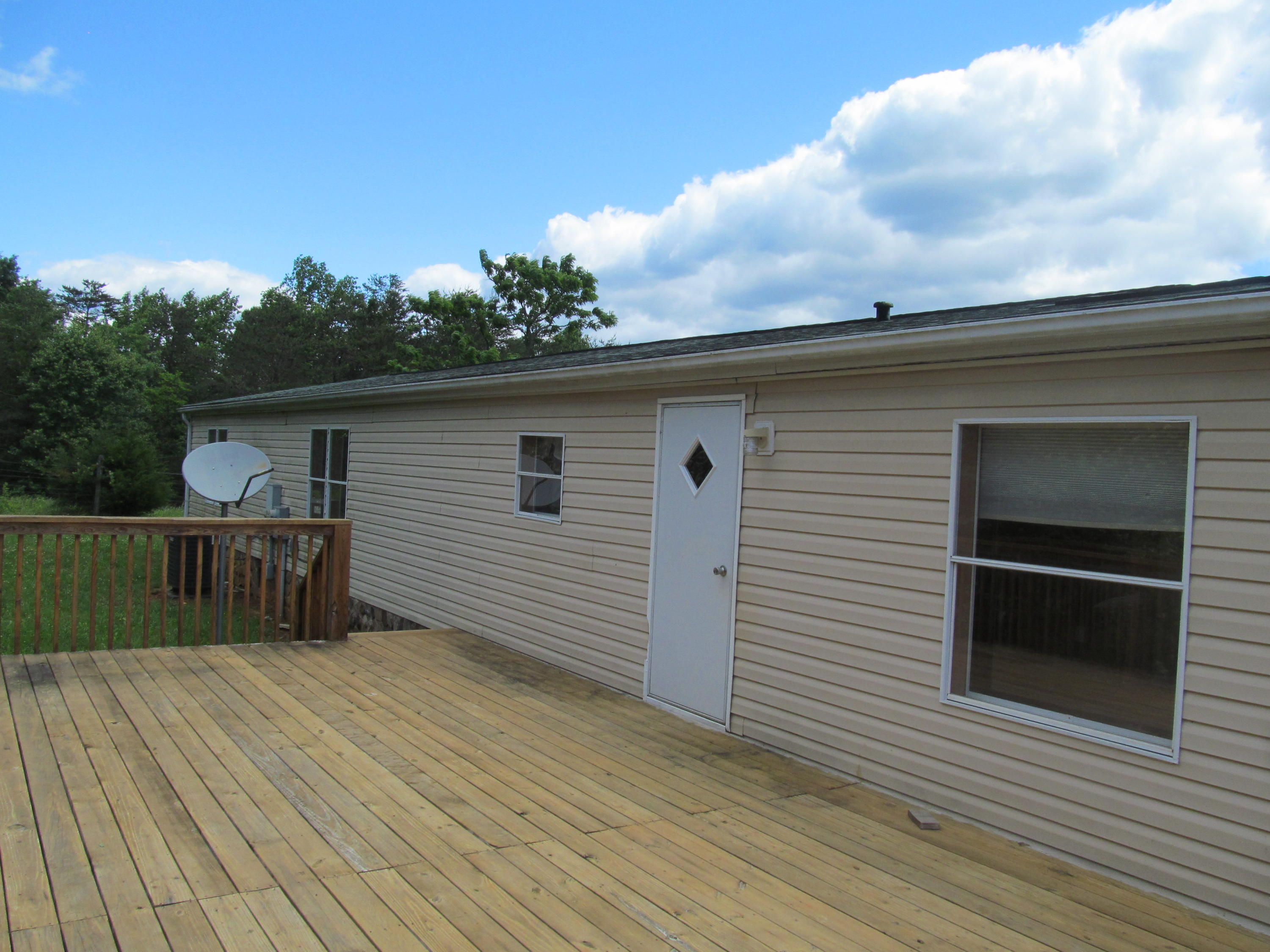3016 Quarles Road Thaxton, VA 24174 - Photo 20 of 41 a view of a house with a balcony